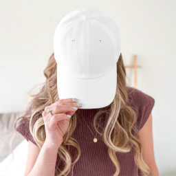 baseball cap held in hand mockup